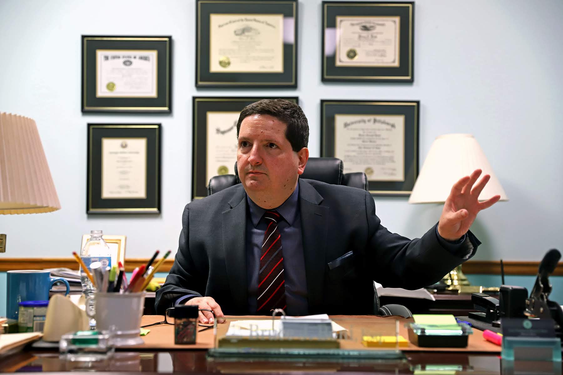 McKees Rocks Magisterial District Judge Bruce Boni explains how court costs are added to traffic fines. (Photo by Jay Manning/PublicSource)